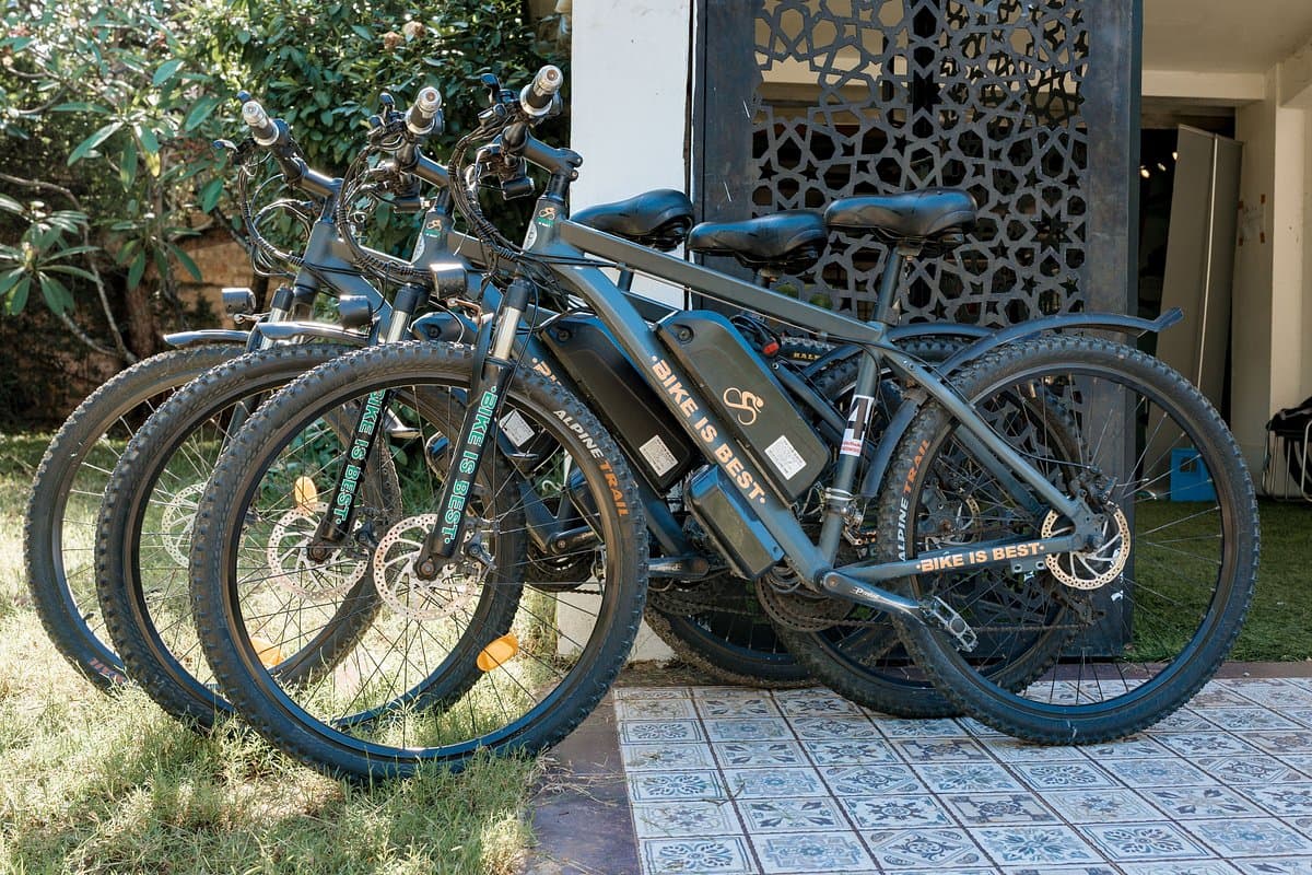 Electric bikes lined up outside the hub